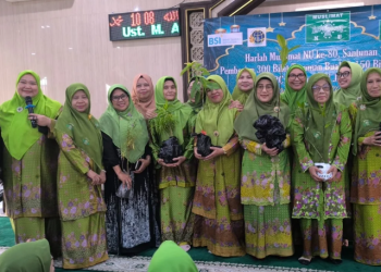 Distribusi pohon pada Harlah MNU ke-80 bertema Ketahanan Pangan Keluarga dan Perempuan Mandiri.